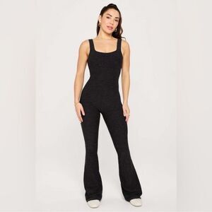 Fabletics HeatherFlex Kick Flare Jumpsuit Black Heather, Size Medium